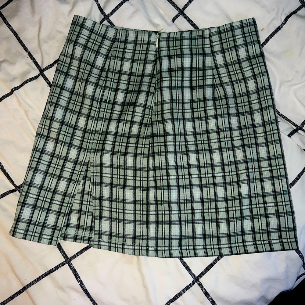 Princess Polly A lined skirt in size 2